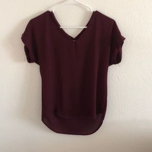 A maroon shirt